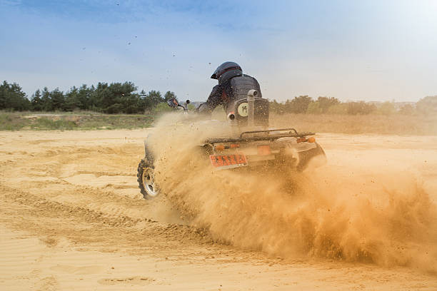 istock Racing ATV in the sand. 531172682