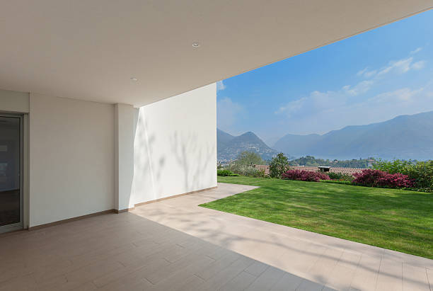 istock House, veranda with green lawn 531172824