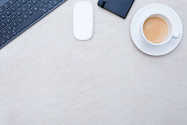 istock cup of coffee on a business desk 531173233