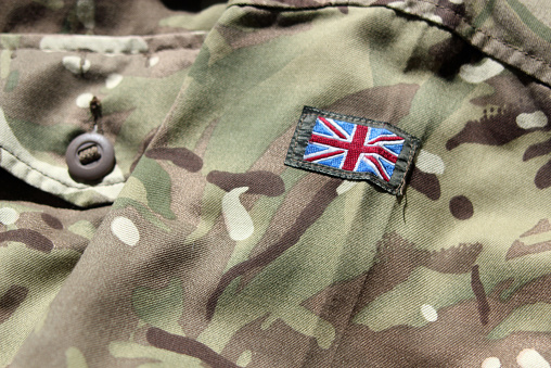 Primer plano del Reino Unido uniforme militar con bandera photo