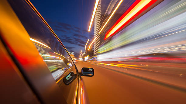 istock night city drive by car 531173290