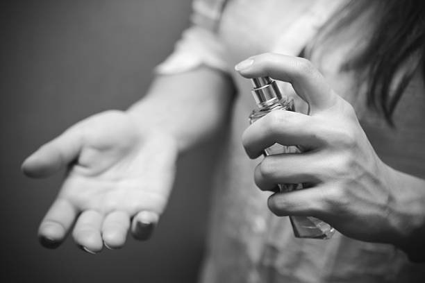 istock Woman applying perfume on her wrist 531173535
