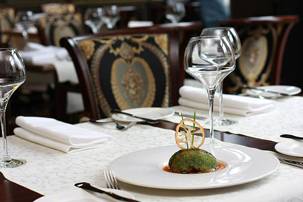 Vegetarian creative food in luxurious restaurant - served table