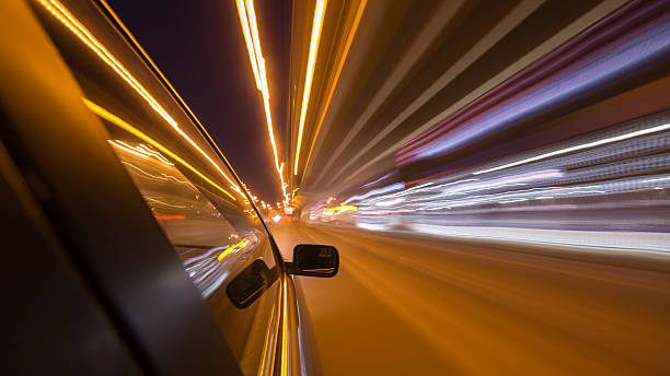 istock night city drive by car 531173802