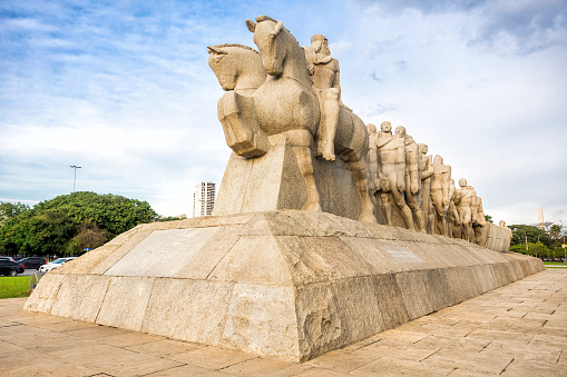 Sao Paulo, Brazil - June 8, 2014: Monument to the Bandeiras, a large-scale sculpture by the Italian-Brazilian sculptor Victor Brecheret, commissioned by the government of Sao Paulo in 1921 and completed in 1954 at the entrance of Ibirapuera Park in São Paulo, Brazil. 