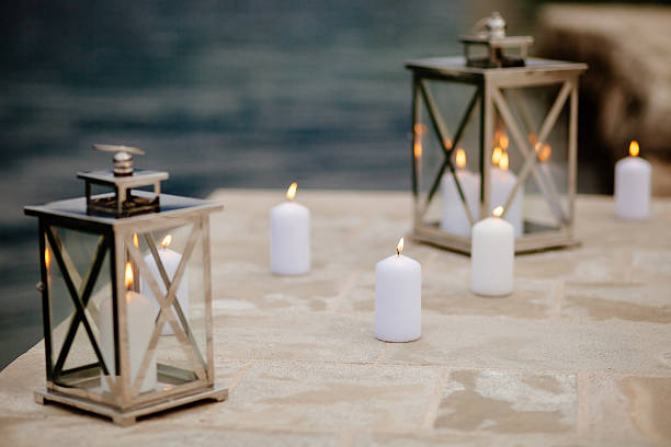 istock romantic candles on the pier near the water 531175211