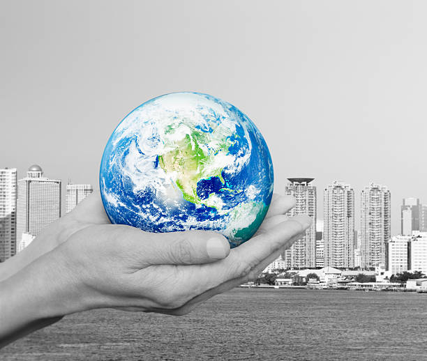 istock Earth in hand, Elements of this image furnished by NASA 531176596