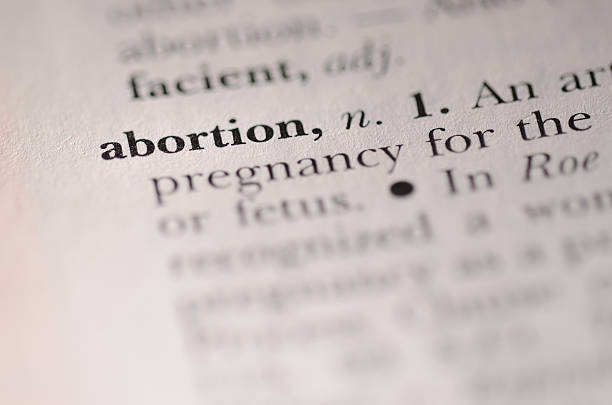 Abortion Dictionary word - abortion  abortion photos stock pictures, royalty-free photos & images