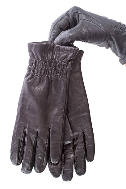 istock Hand with new black leather gloves 531177598