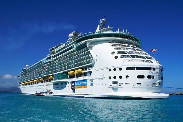 Freedom of the seas in Labadee Labadee, Haiti - October 12, 2009:  Royal Caribbean Cruises, Freedom of the seas cruise ship anchored in Labadee. Labadee is a port located on the northern coast of Haiti. It is a private resort leased to Royal Caribbean Cruises. caribbean stock pictures, royalty-free photos & images