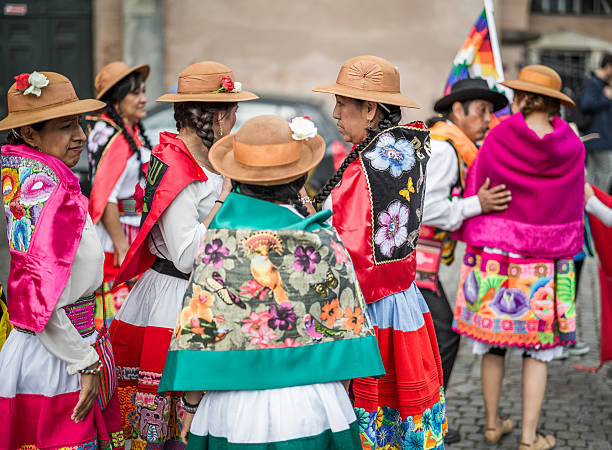 Peruvian women in the Copenhagen Whitsun Carnival, 2016 Copenhagen, Denmark - May 14, 2016: A group of Peruvian women and a man ready to enter the parade in the Copenhagen Whitsun Carnival, 2016. whitsun stock pictures, royalty-free photos & images