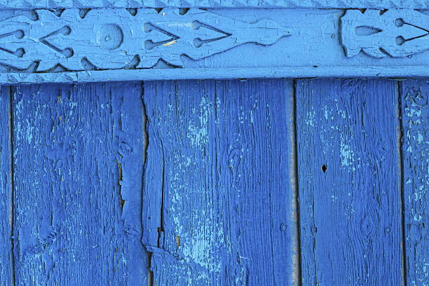 istock Paint peeling off old wooden boards 531179610