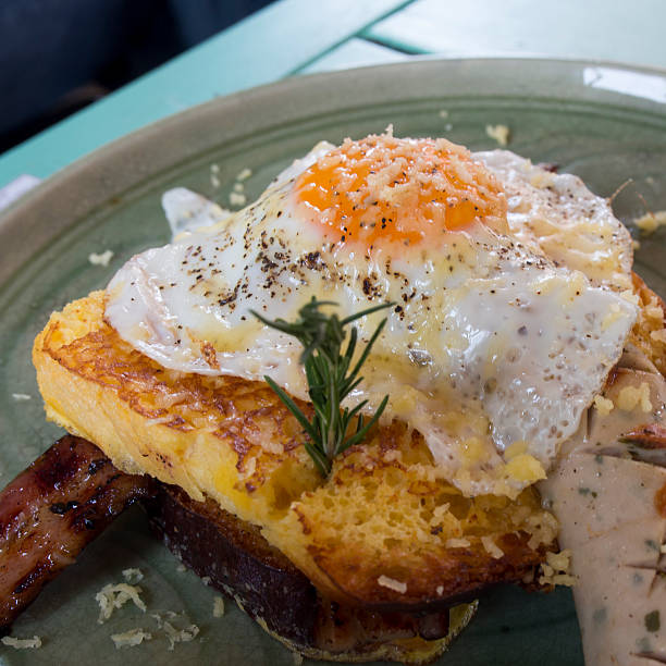 istock Croque madame delicious french breakfast with bacon, cheese, egg 531182146