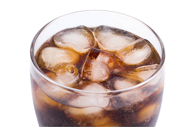 istock Glass with Coca and ice on a 531182248