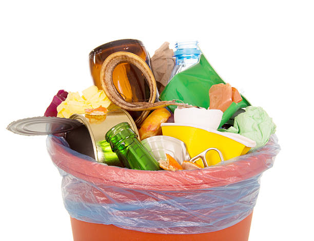 istock Bin completely filled with household waste isolated on white 531182536