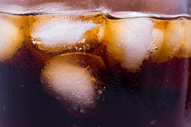 istock Glass with Coca and ice on a 531182558