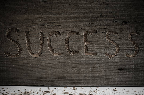 istock Word success carved in wood 531183378