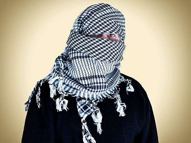 istock palestinian wear with keffiyeh 531183769