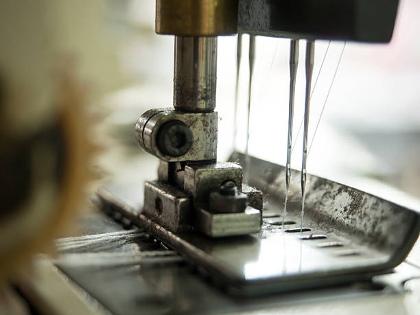 istock double needles on sewing machine in textile factory. 531184070