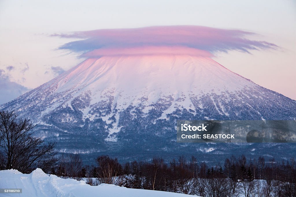 Mt Yotei Hokkaido, Japan Purple Sunset Mt Yotei Purple Sunset. Mount Yotei is a large volcano near Niseko, Kutchan, Otaru, and Sapporo in Hokkaido Japan. Rusutsu Resort Stock Photo