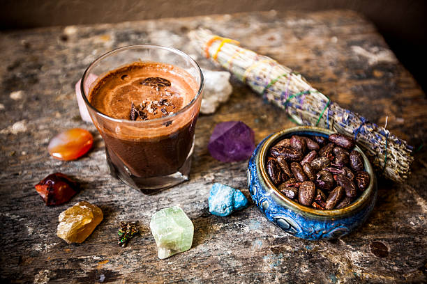 Cacao Beverage and Chakra Gemstones Cacao Beverage and Chakra Color Gemstones ceremony stock pictures, royalty-free photos & images