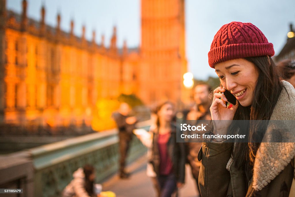chinese tourist woman on the phone in london 20-29 Years Stock Photo