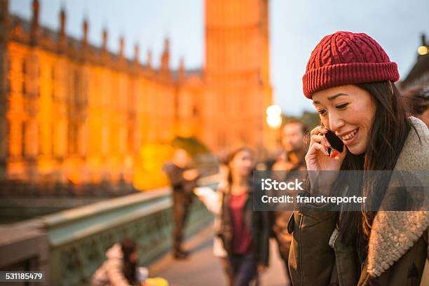 Chinese Tourist Woman On The Phone In London Stock Photo - Download Image Now - 20-29 Years, City, Fun