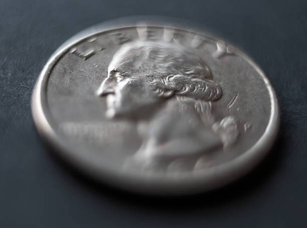 istock Extremely thin selective focus of american quarter dollar 531186524