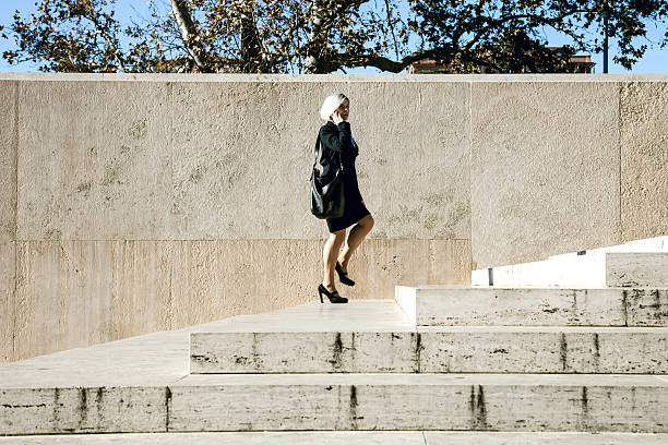 istock Professional woman walking through the stairs 531188323