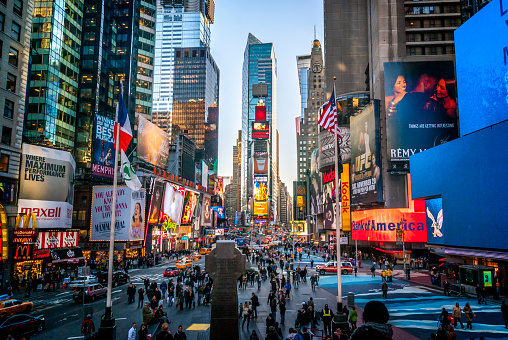 NEW YORK, United States – September 15, 2022: An overcrowded Time square in New York architecture and billboards in the evening