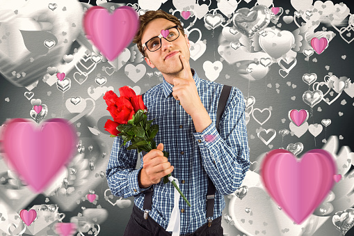 Composite image geeky hipster holding a bunch of roses
