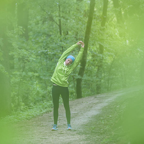 istock Sporty woman  working out in forest. 531189104