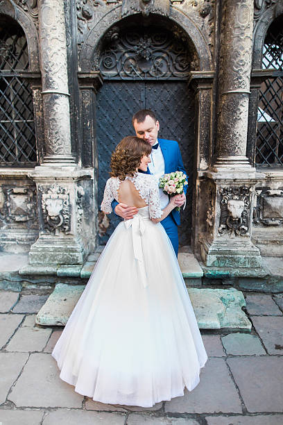 istock Sensual romantic newlywed bride and groom hugging in front of 531189710