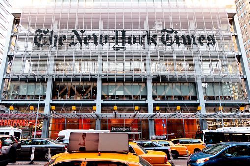 New York, USA - June 7, 2014: Facade of the New York Times headquarters building on 8th Ave. in Midtown Manhattan. The building was completed in 2007. The New York Times is an american daily newspaper that was founded in 1851.
