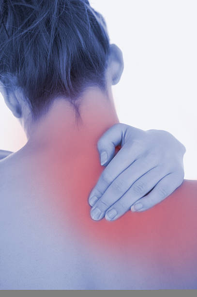 istock Closeup of topless woman massaging back 531191573
