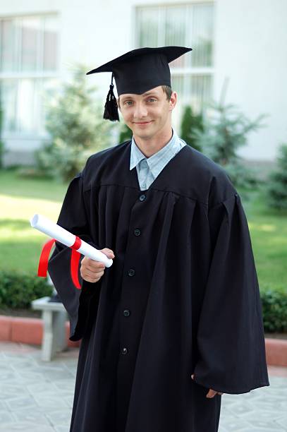 istock The graduate with a diploma in hand 531192278