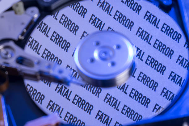 Close up view of computer hard drive under blue light.The text \
