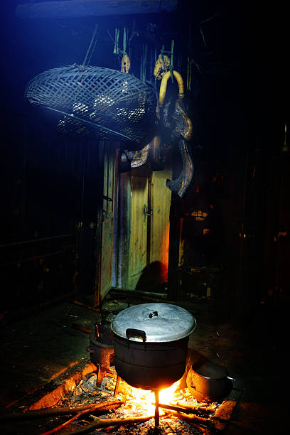 meat drying on fire in Hmong kitchen in china