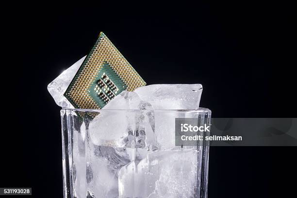Computer Cpu Chip In Flass Full Of Ice Stock Photo - Download Image Now - Black Background, Business Finance and Industry, CPU