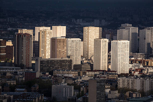 Paris suburban 60s concrete tower blocks evening sunshine