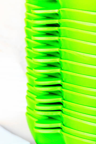 istock Stacks of many white plates on a wire rack shelf 531193318