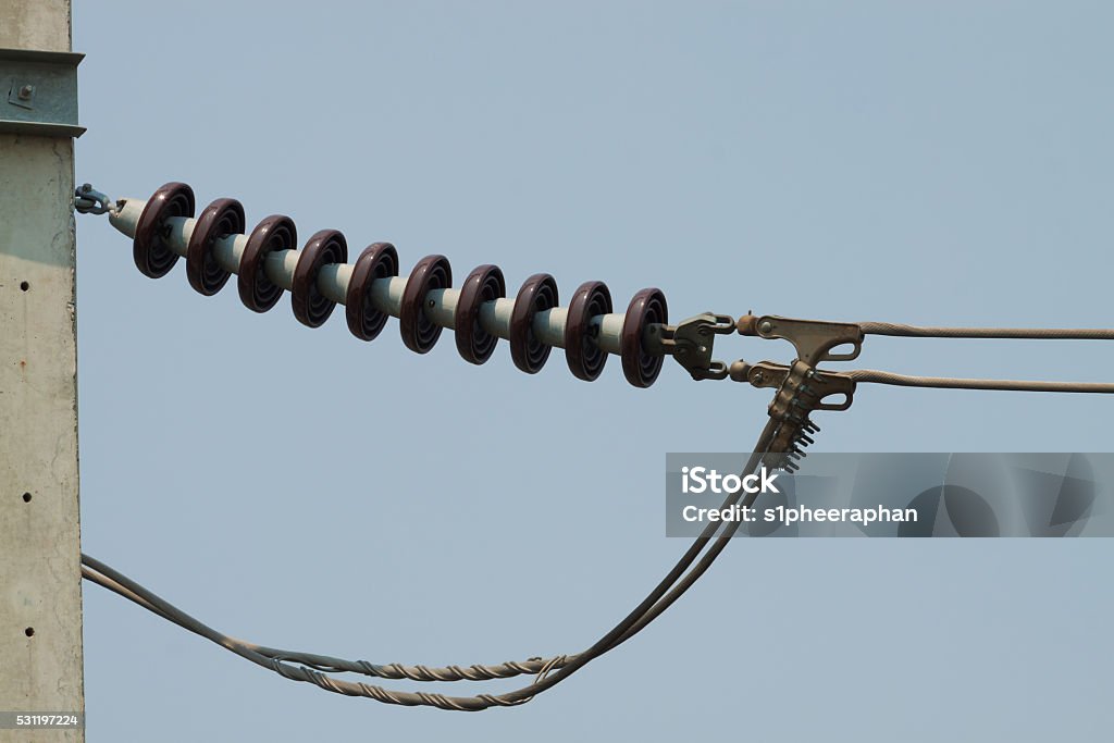 Hight voltage pole and wire on sky background The high voltage pole and wire on the sky background Cable Stock Photo