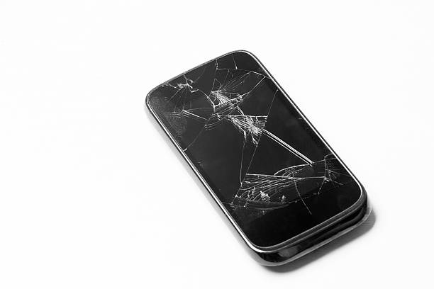 damaged smart phone on isolated background