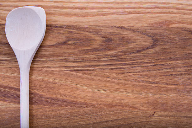 istock wooden spoon on dark wood 531211549