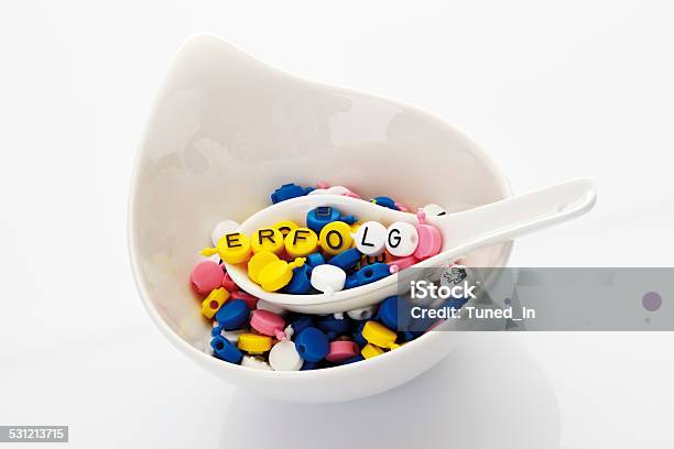 Letters On Spoon In Soup Bowl Forming The Word Success Stock Photo - Download Image Now