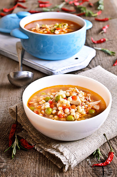 istock Soup with small pasta, vegetables and pieces of meat 531223867