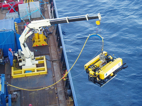 Taranto, Italy - June 23rd, 2005: The UK Submarine Rescue Service's remotely operated vehicle (ROV) being launched. This will be used to clear debris from around a stricken submarine and to deliver survival stores to buy time until a rescue can be mounted. Training exercises are held about 4 times a year.