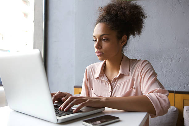 istock Young woman working on laptop 531224643