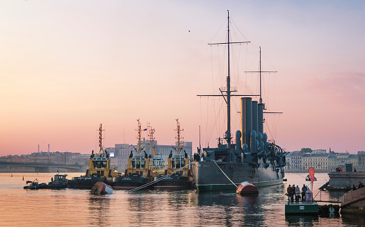 SAINT PETERSBURG, RUSSIA - SEPTEMBER 21 2014: Towbars prepare to transport cruiser 