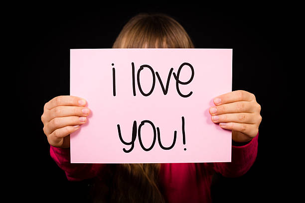 istock Child holding I Love You sign 531226349